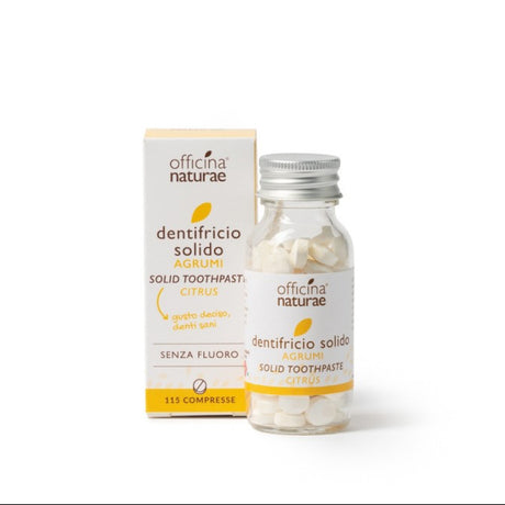 Vasetto in vetro con dentifricio solido in pastiglie agli agrumi OFFICINA NATURAE, alternativa ecologica senza plastica.